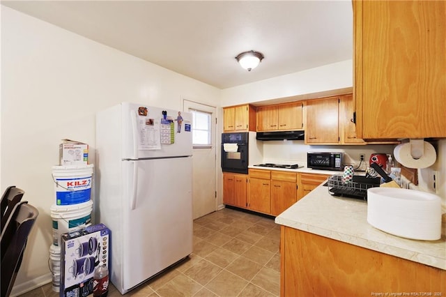 kitchen with black appliances