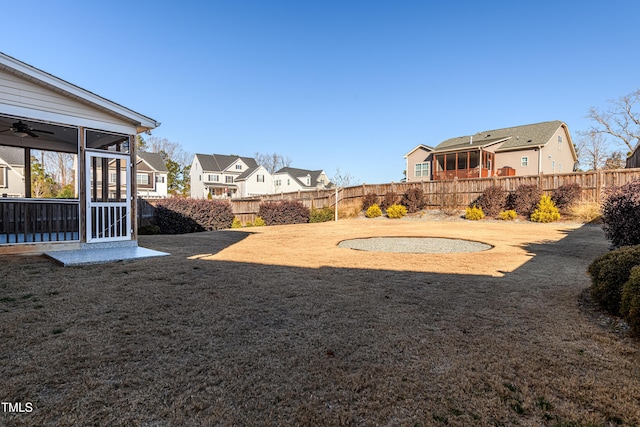 view of yard featuring a sunroom