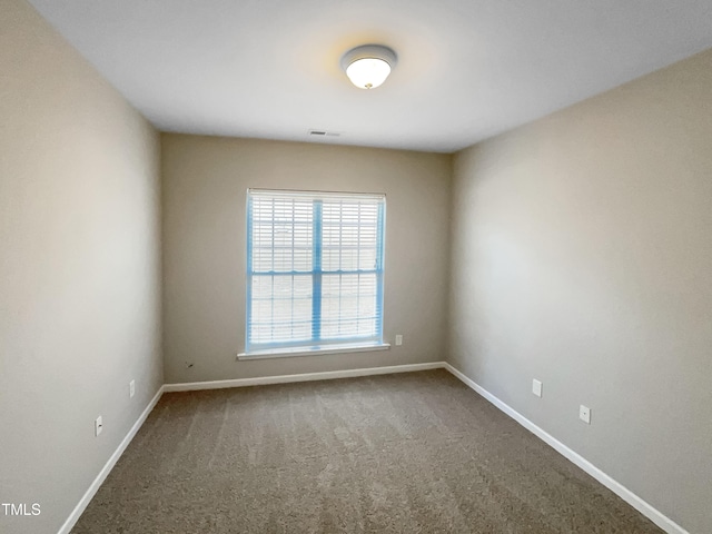 1012 Fulbright Dr, Morrisville, NC 27560 - carpeted spare room with baseboards