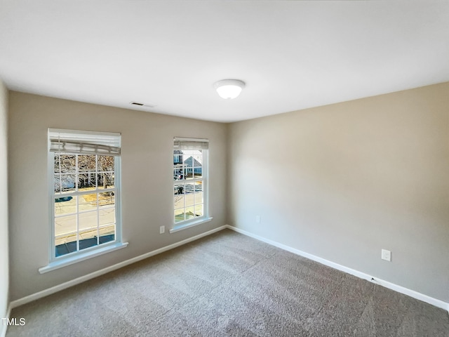 1012 Fulbright Dr, Morrisville, NC 27560 - carpeted empty room featuring baseboards