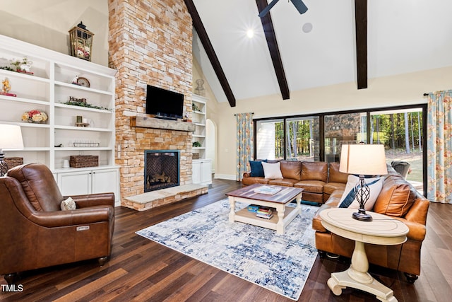 living room featuring high vaulted ceiling, ceiling fan, dark hardwood / wood-style floors, a fireplace, and beam ceiling