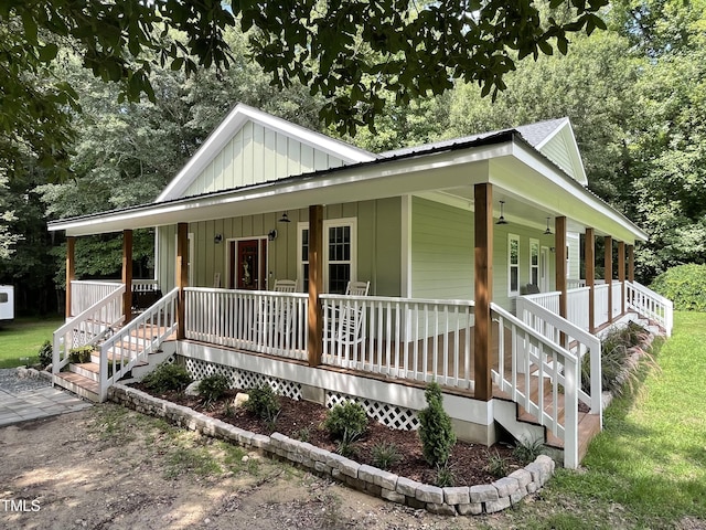 farmhouse-style home with board and batten siding and covered porch