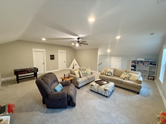 carpeted living area with recessed lighting, visible vents, a ceiling fan, vaulted ceiling, and baseboards