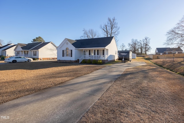 ranch-style home with covered porch