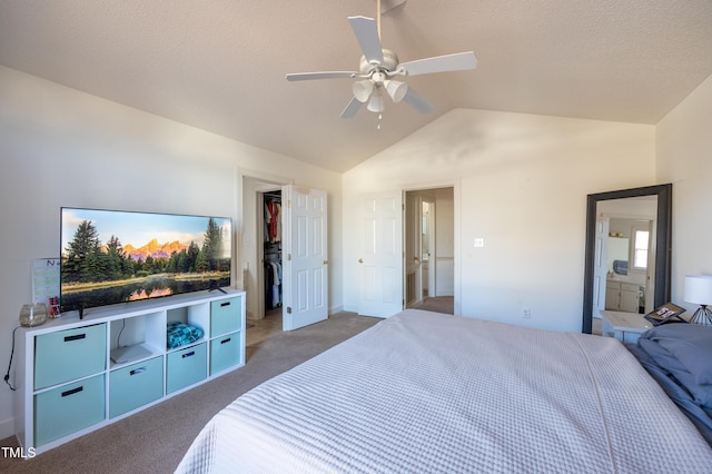 carpeted bedroom with ceiling fan and lofted ceiling