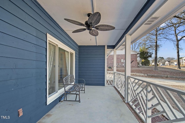 balcony featuring ceiling fan and covered porch