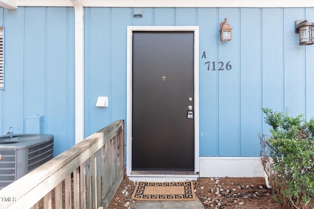 property entrance featuring cooling unit