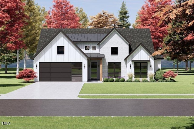 view of front of house with a garage and a front lawn