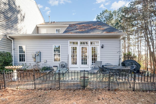 back of property featuring a patio area