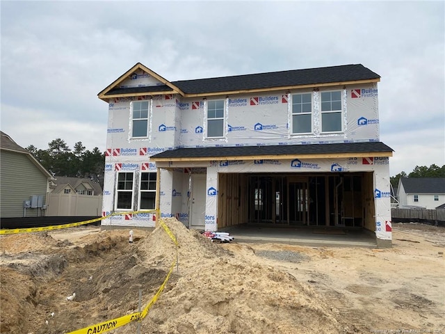 property in mid-construction with an attached garage