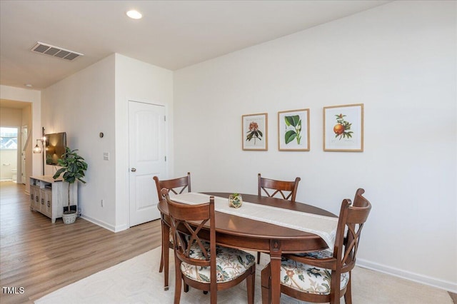 dining area featuring light hardwood / wood-style floors