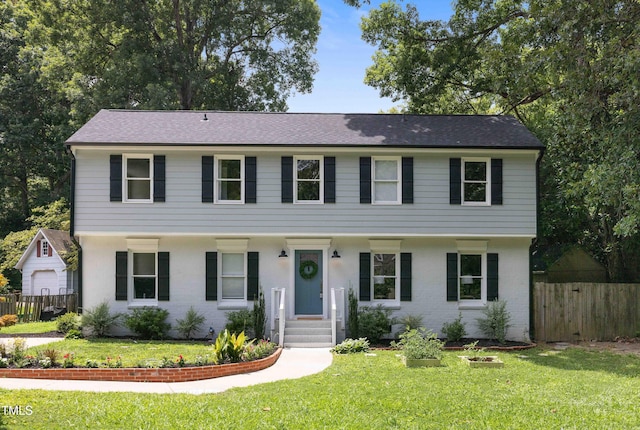 view of front facade with a front lawn