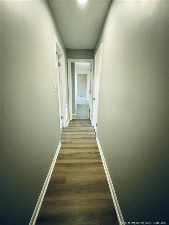 hallway featuring hardwood / wood-style floors