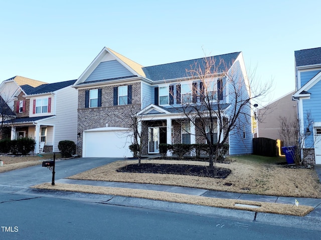 view of front of property featuring a garage