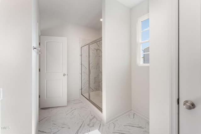 bathroom featuring an enclosed shower