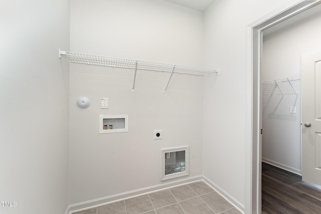 washroom featuring hookup for an electric dryer, hookup for a gas dryer, tile patterned floors, and hookup for a washing machine