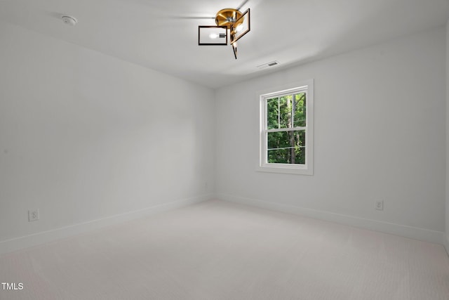 empty room with carpet flooring