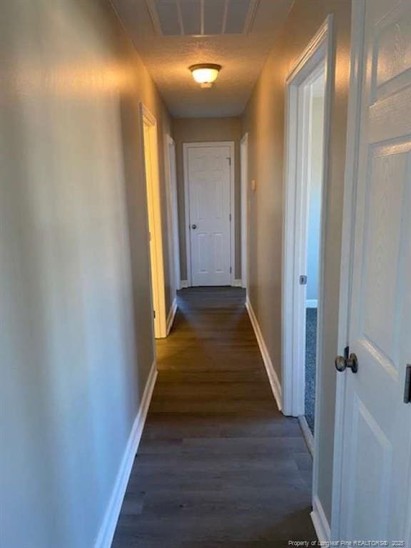 hall featuring dark hardwood / wood-style flooring