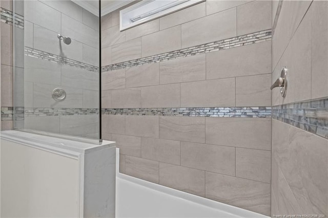 bathroom with a tile shower