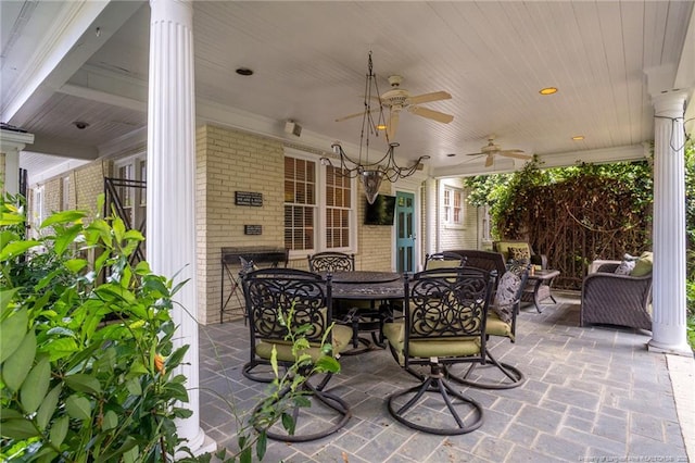 view of patio / terrace with outdoor dining area and a ceiling fan
