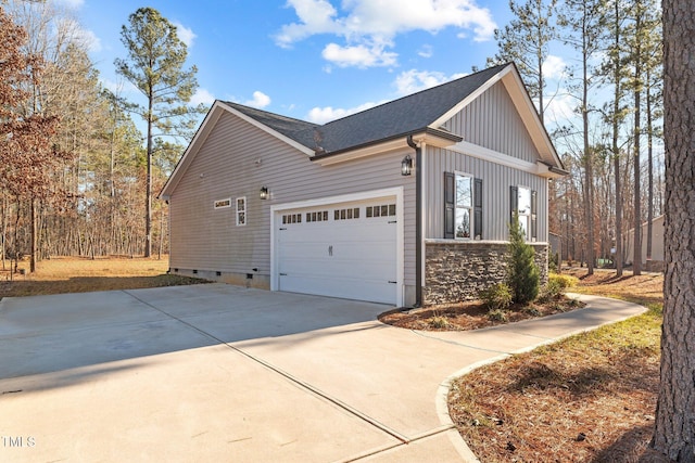 view of property exterior with a garage