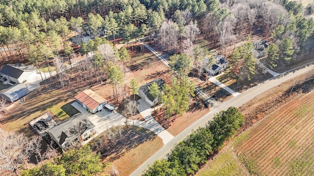 birds eye view of property featuring a rural view