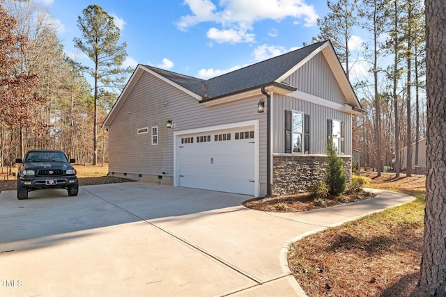 view of property exterior with a garage