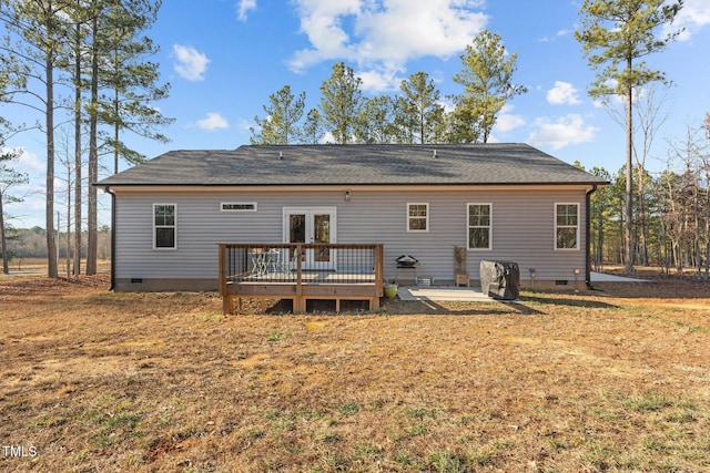 rear view of property with a patio area and a deck