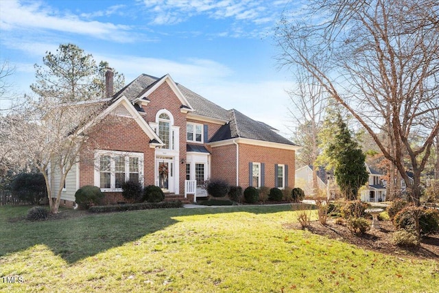 front facade featuring a front lawn