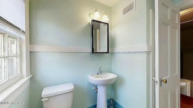 bathroom featuring toilet