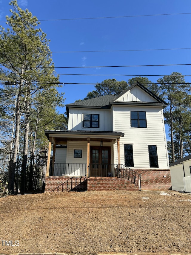 view of front of property featuring covered porch