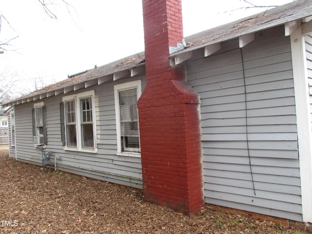 view of property exterior with cooling unit