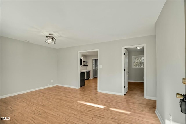 unfurnished living room with light hardwood / wood-style flooring