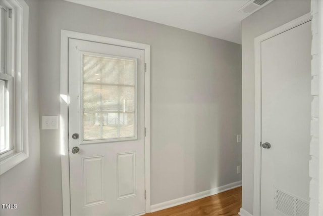 doorway featuring hardwood / wood-style flooring