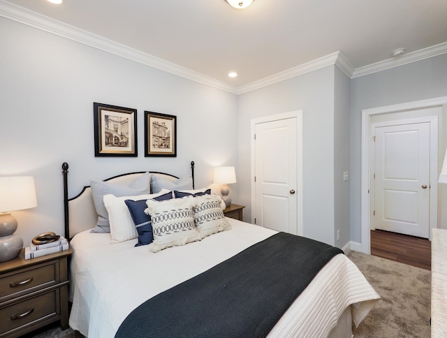 carpeted bedroom featuring ornamental molding