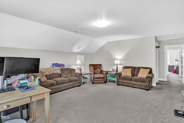 living room featuring carpet and lofted ceiling