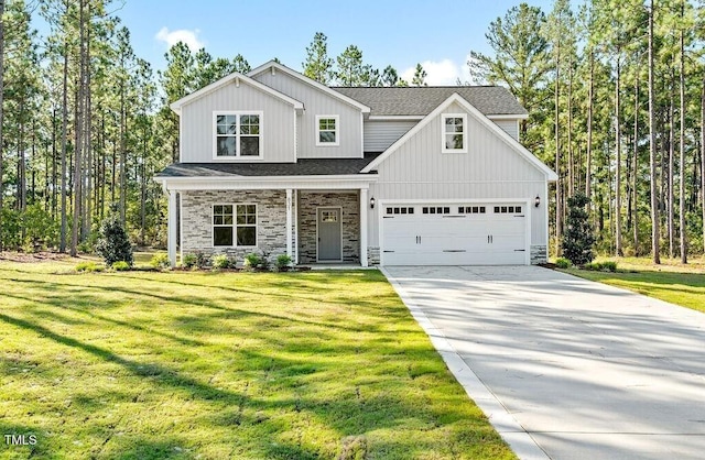 view of front of house with a front lawn and a garage