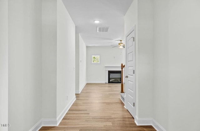 hall featuring light hardwood / wood-style flooring