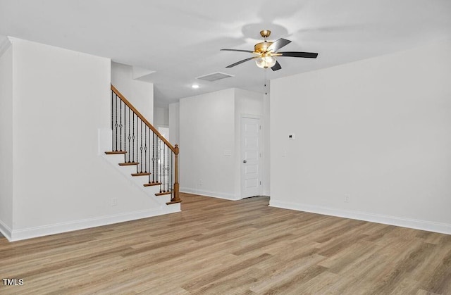 interior space featuring light wood-type flooring and ceiling fan