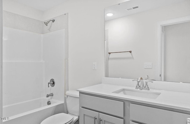 full bathroom with shower / bathing tub combination, vanity, and toilet