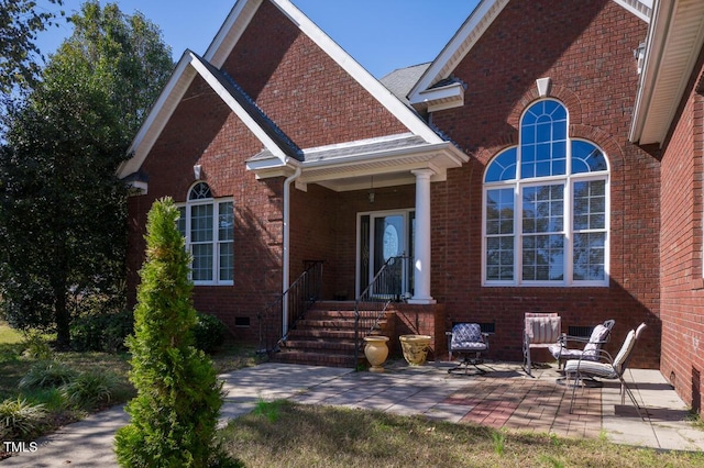 back of house with a patio