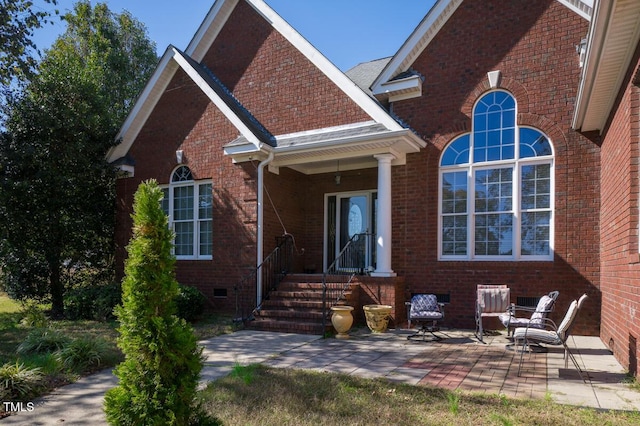 back of house with a patio