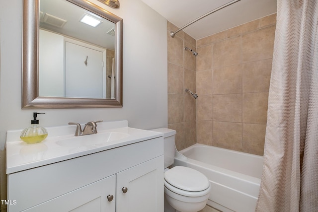 full bathroom featuring toilet, vanity, and shower / bath combination with curtain