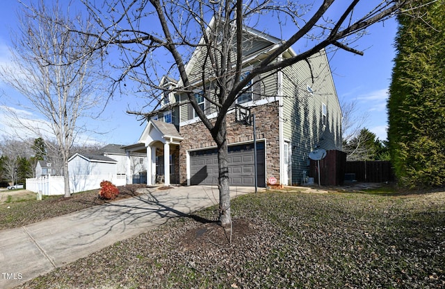 view of front of home with a garage