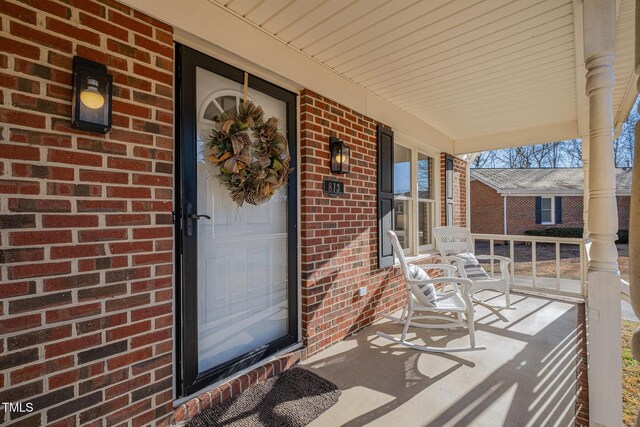 property entrance with a porch