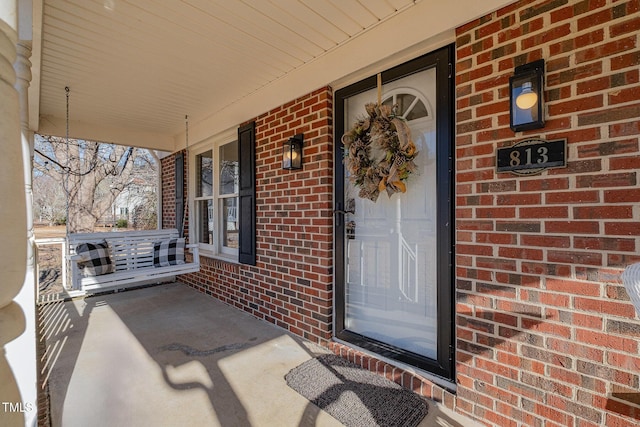 entrance to property with covered porch