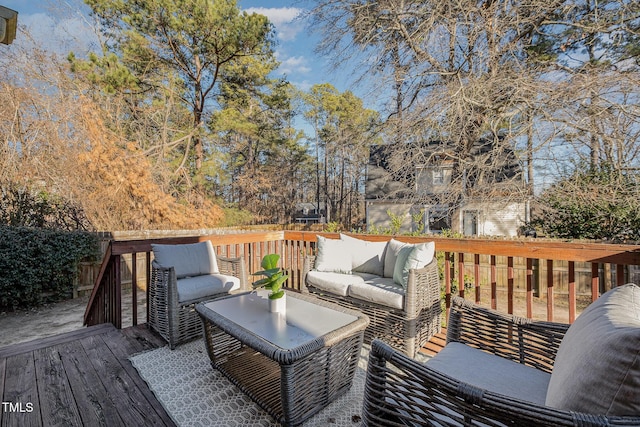 wooden deck with outdoor lounge area