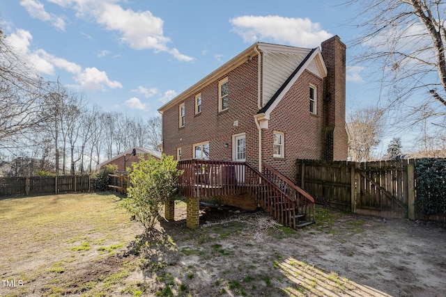 rear view of property with a deck