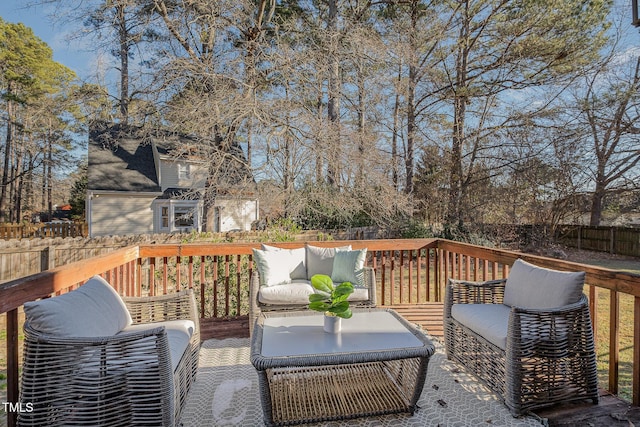 wooden deck with an outdoor hangout area