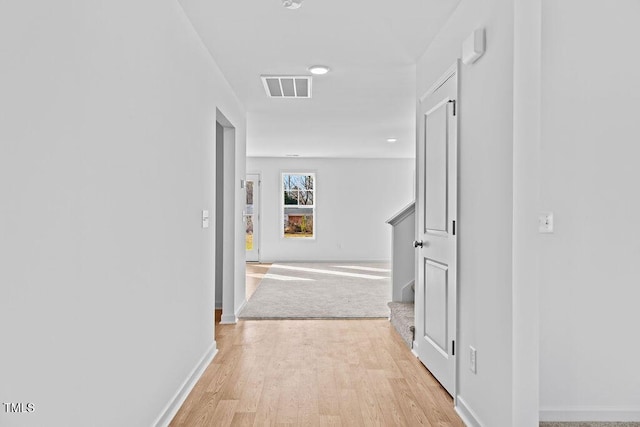 hallway featuring light hardwood / wood-style flooring